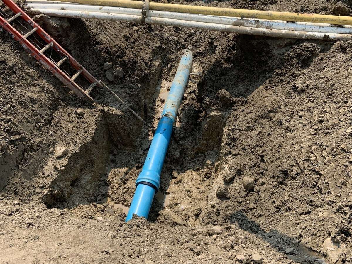 Repaired water main in an open excavation