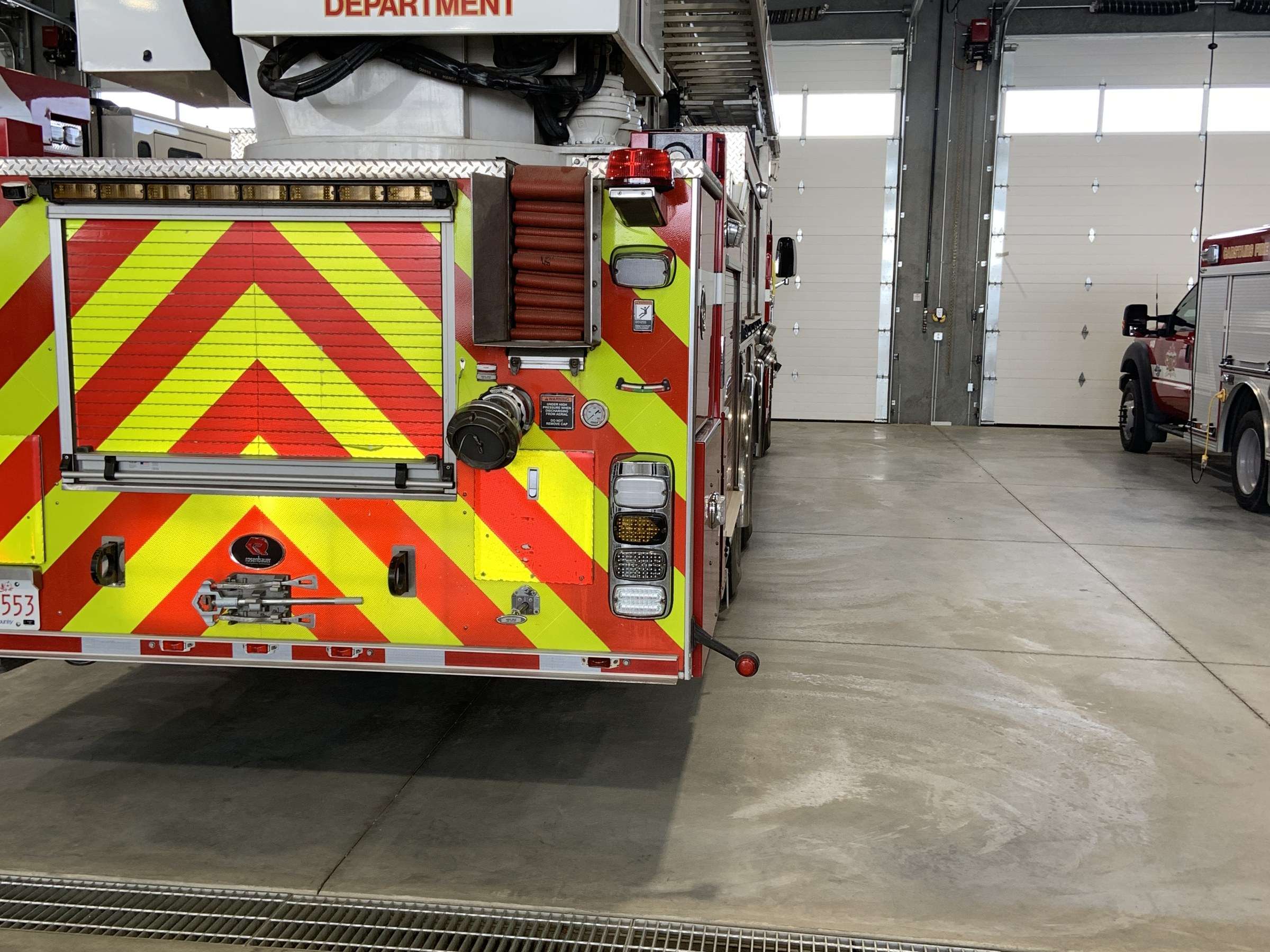 Fire engine parked in an apparatus bay