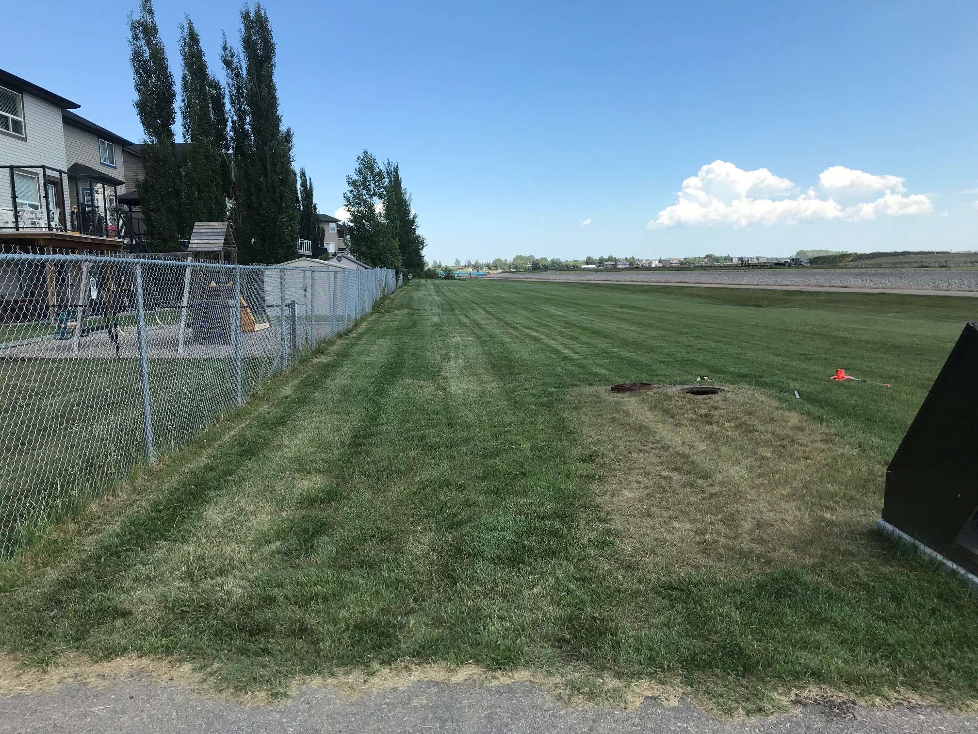 Open field at the Chestermere storm outfall study area