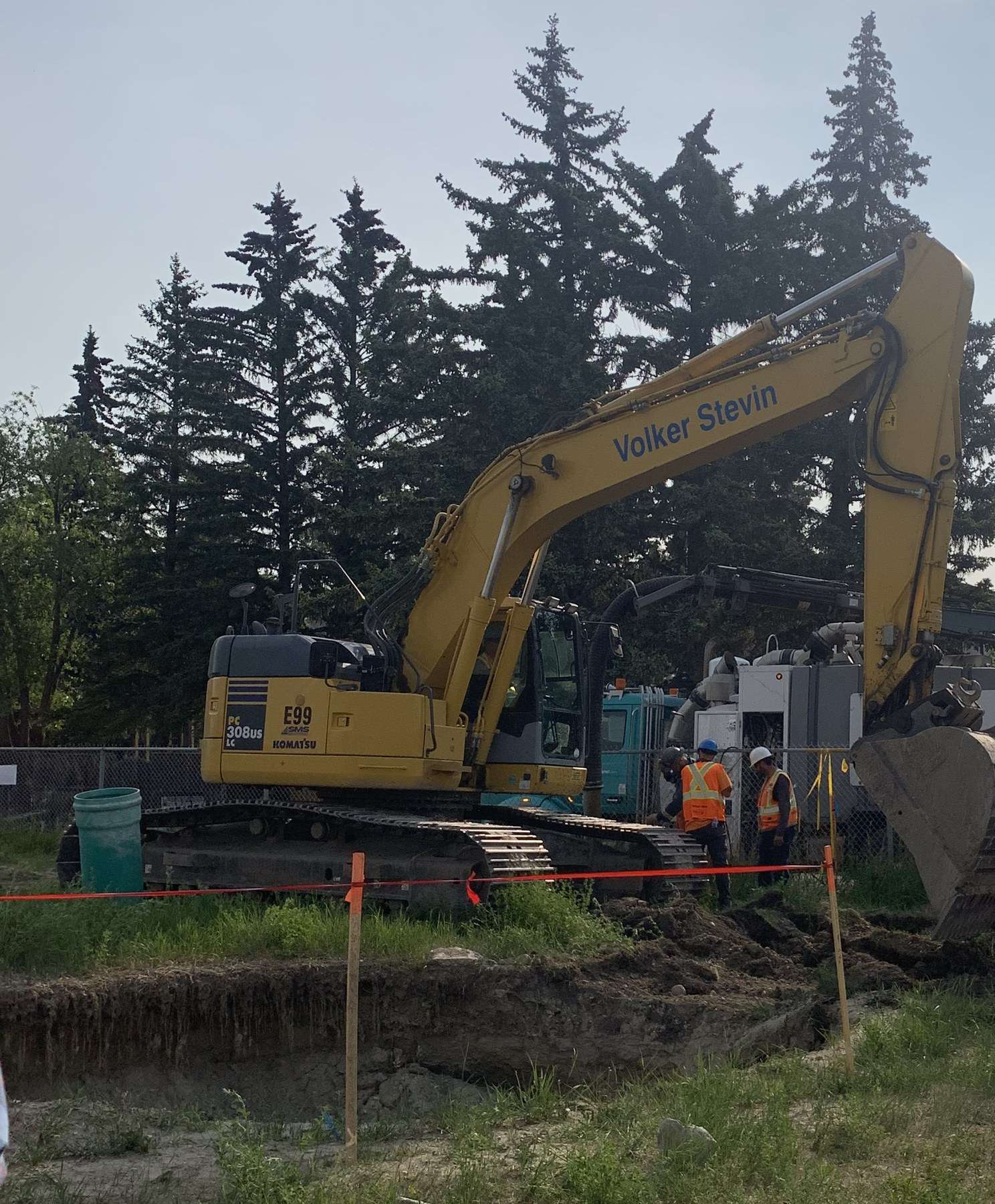 Excavator at the Bow River raw water line repair site